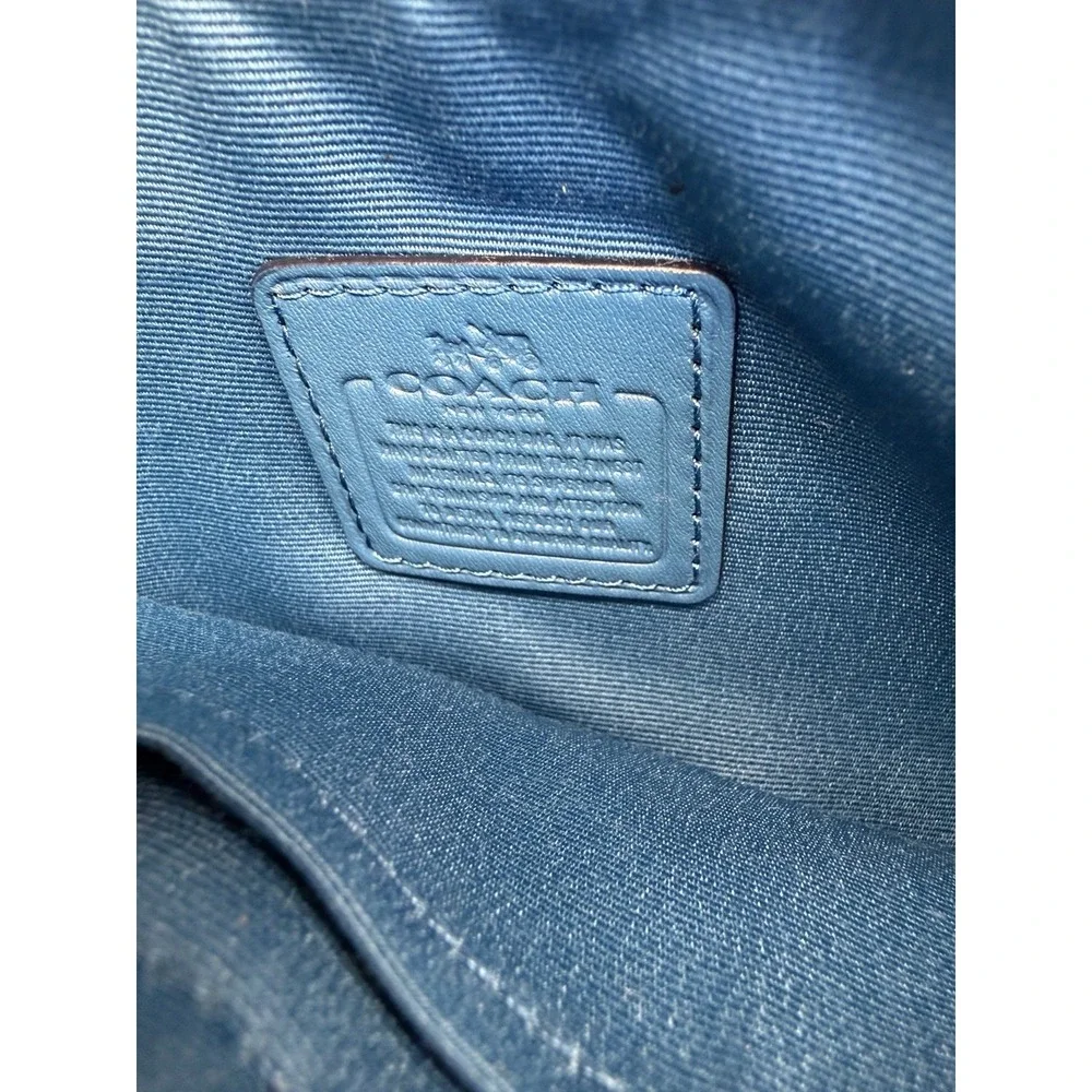 Coach Nolita Small Wristlet in Peacock Blue Pebble Leather with‎ Shearling Trim